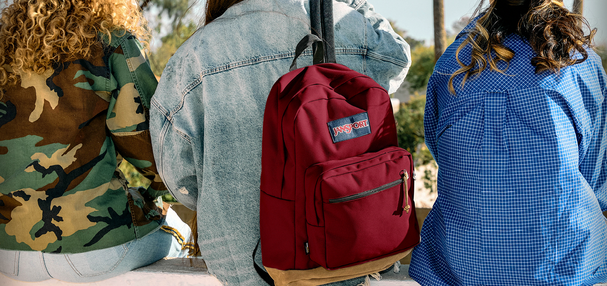 jansport backpack on people Superbreak With a signature suede leather base and classic JanSport front organiser pocket Clearance Jansport Jansport Backpack Journeys